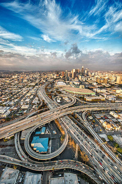Flying above the big city Aerial view of Los Angeles and big freeway intersection. Many details visible in the image. highway 405 photos stock pictures, royalty-free photos & images