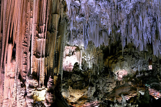 Interior of Natural Cave in Andalusia, Spain Interior of Natural Cave in Andalusia, Spain -- Inside the Cuevas de Nerja are a variety of geologic cave formations which create interesting patterns nerja caves stock pictures, royalty-free photos & images