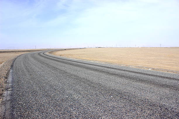 istock Asphalted road and the blue sky 490399312