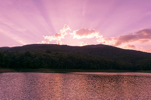 istock River Mountain sunshine and purple sky in evening time 490399858