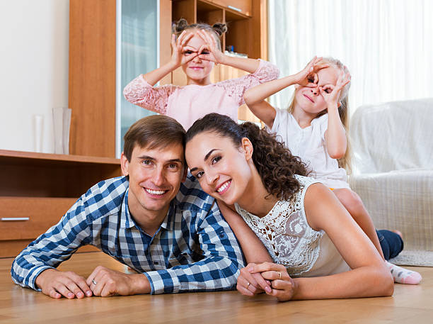 istock Relaxed family in domestic interior 490400726