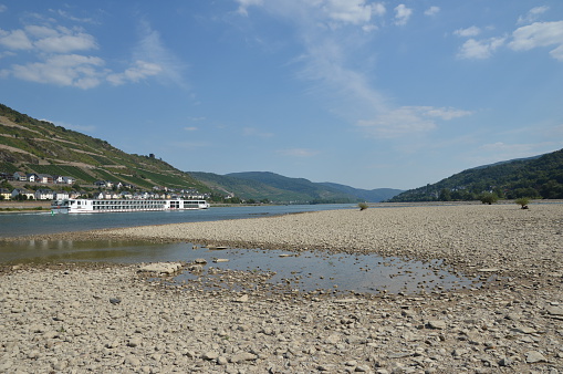 Bacharach, Germany - August 22, 2015: River rhine during heavy drought in summertime because of global warmingBacharach, Germany - August 22, 2015: River rhine during heavy drought in summertime because of global warming
