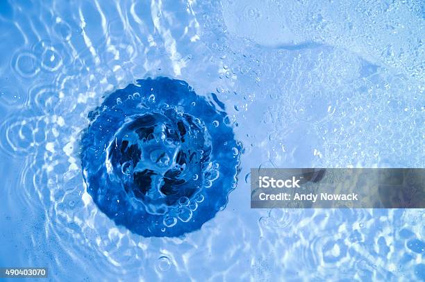 Olutlet In Blue Stock Photo - Download Image Now - Bathtub, Drain, Kitchen Sink