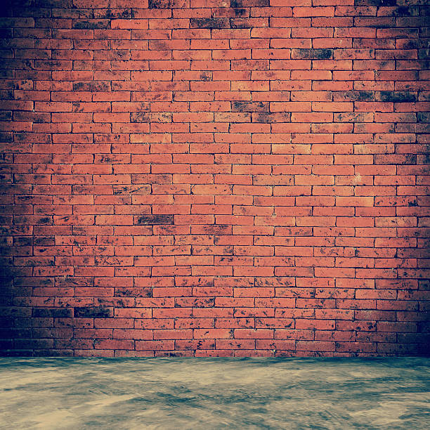 istock red brick wall and room interior with floor concrete vintage 490403332