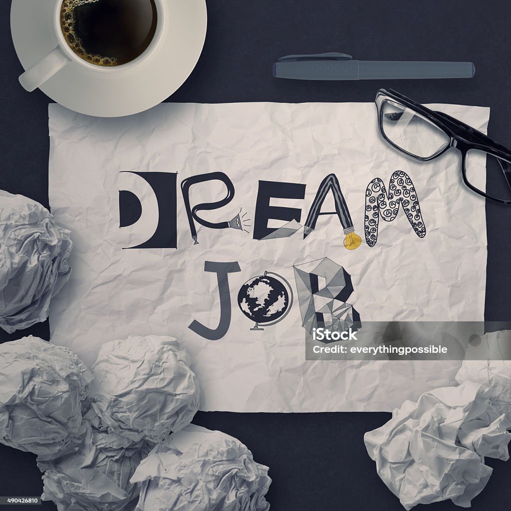 hand drawn design words DREAM JOB on crumpled paper hand drawn design words DREAM JOB on crumpled paper background as concept 2015 Stock Photo