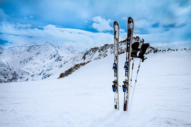 istock ski equipments on snow slope 490427254