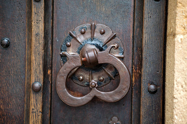 istock Old Entrance Door with knocker 490427332
