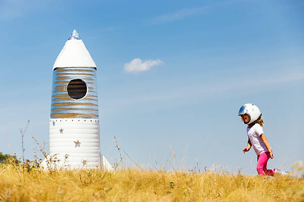 istock Happy child dressed in an astronaut costume 490427992