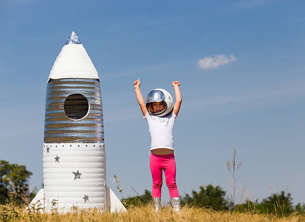 istock Happy child dressed in an astronaut costume 490428136