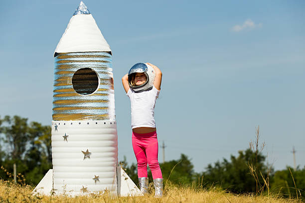 istock Happy child dressed in an astronaut costume 490428184