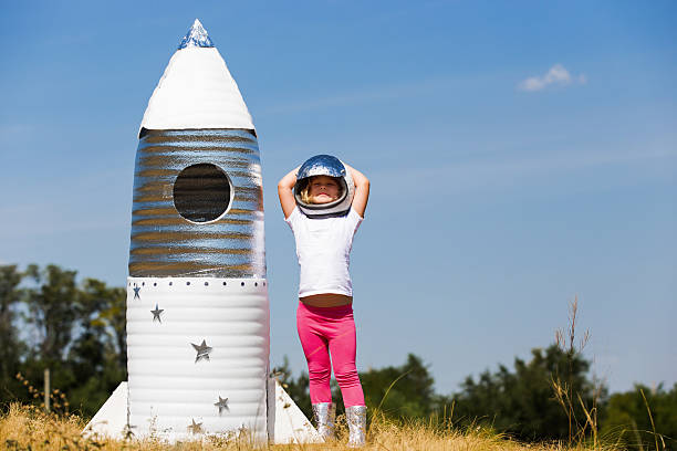 istock Happy child dressed in an astronaut costume 490428290