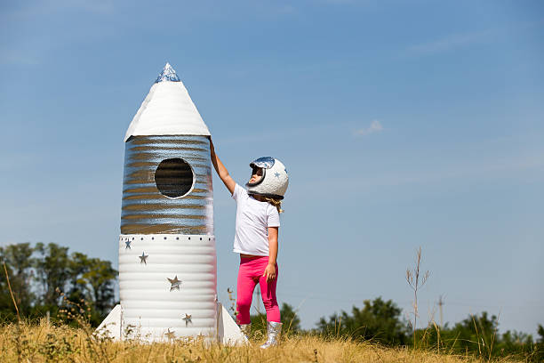 istock Happy child dressed in an astronaut costume 490428370