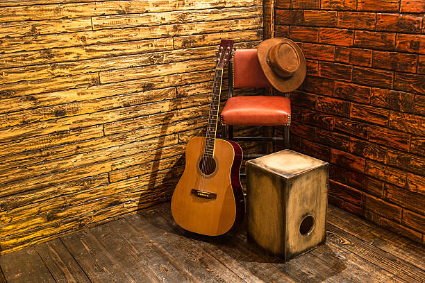 istock Music instruments on wooden stage 490428554
