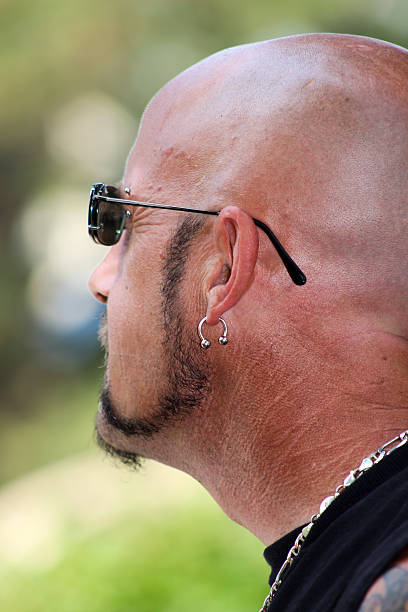 istock Close-up Side and Rear View of Bald Man With Earring 490430740