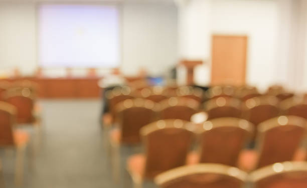 istock Blurred image of people in auditorium , blur with bokeh 490432284