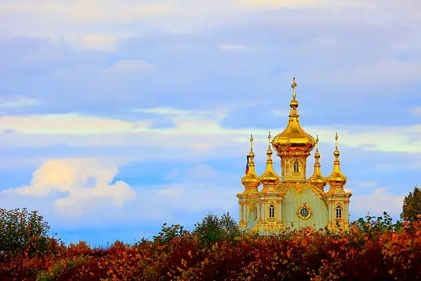 Dramatic sunrise, Russian Orthodox chapel Church, gold cupolas, St. Petersburg.