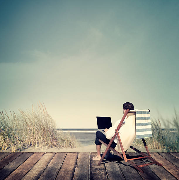 istock Businessman Working Summer Beach Relaxation Concept 490433590