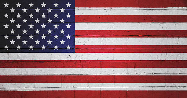 istock The Stars and Stripes Flag painted on a wall 490437916