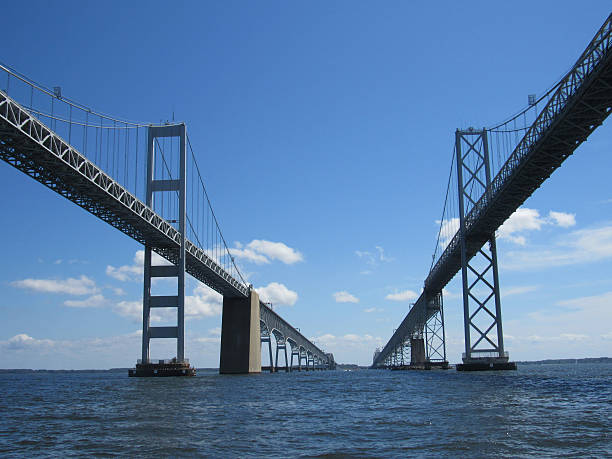 Chesapeake Bay Bridge View from the Water Annapolis, Maryland, USA - September 7, 2015: Chesapeake Bay Bridge View from a boat on the water. channel marker stock pictures, royalty-free photos & images