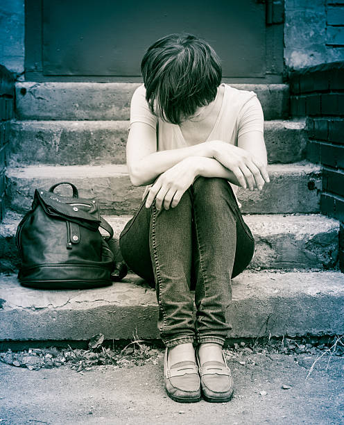 istock woman on stairs 490438978