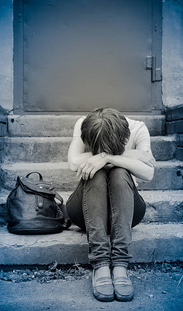 istock woman on stairs 490439018
