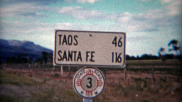 TAOS, NEW MEXICO 1955: Vintage road signs of New Mexico while on road trip holiday.