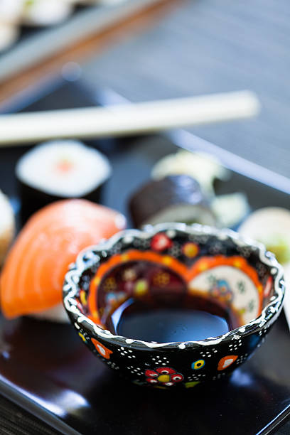 istock Bowl soy sauce on sushi plate 490450977