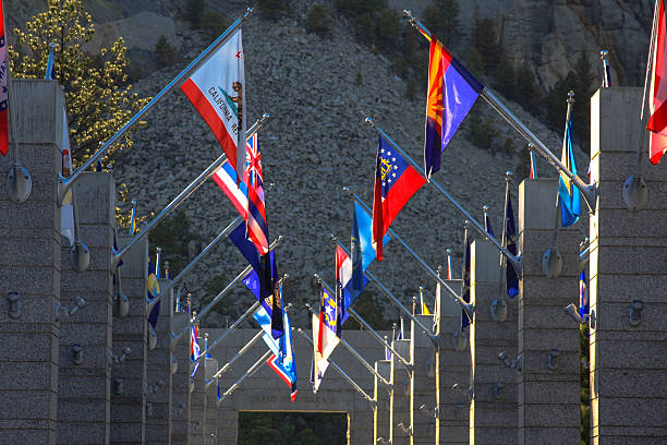 Flags at Mount Rushmore in South Dakota George Washington 1st President, Thomas Jefferson 3rd President, Theodore Roosevelt  26th President, Abraham Lincoln  16th President us state flag stock pictures, royalty-free photos & images