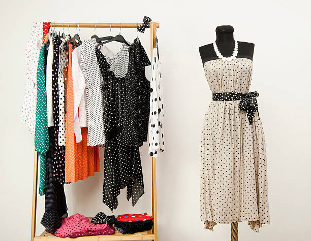 istock Colorful wardrobe with polka dots clothes and accessories. 490452441