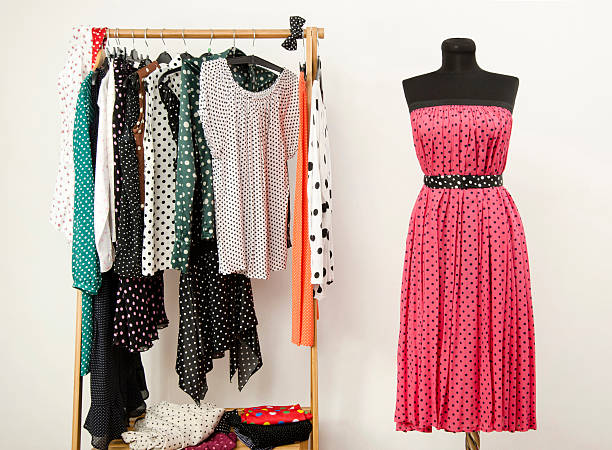 istock Colorful wardrobe with polka dots clothes and accessories. 490452445