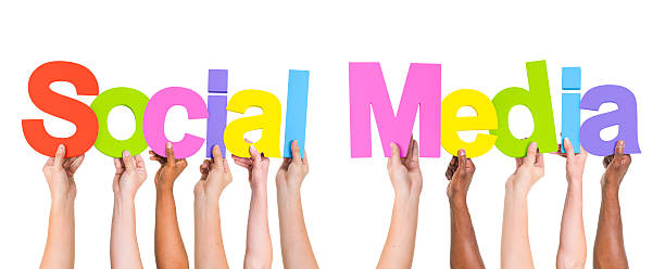 istock Diverse Hands Holding Word Social Media 490453717