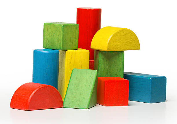 istock toy wooden blocks, multicolor building bricks isolated over white background 490454401