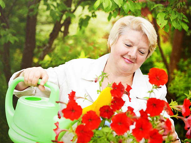 istock mature woman in nature 490456293