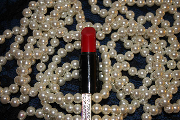 istock Red Lipstick and Pearls 490473654