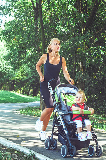 istock Jogger mom with baby in stroller 490474278