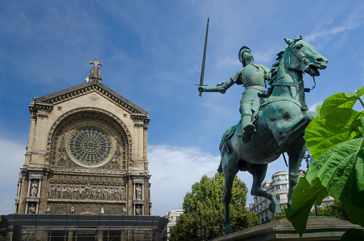 Paris, France - August 26, 2015: Equestrian statue of Joan of Arc, located in front of Church of Saint Augustine, was created by Paul Dubois in 1896. 