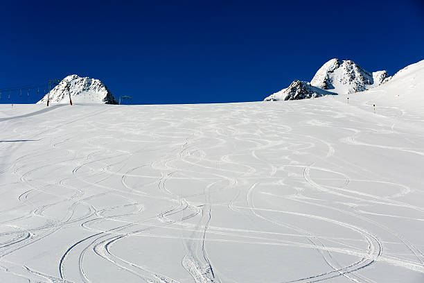 istock Fresh ski tracks on ski slope 490474772