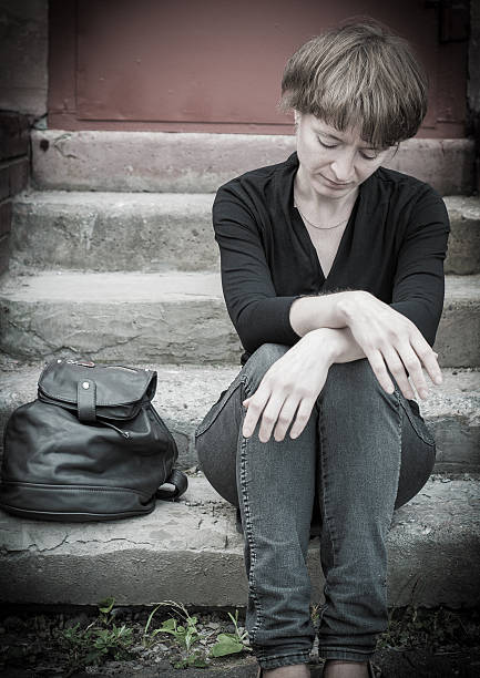 istock woman on stairs 490475170