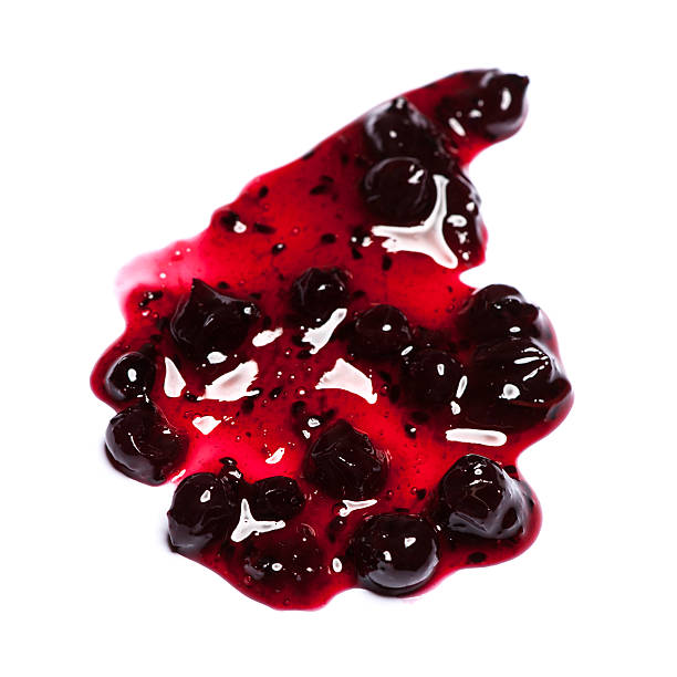 istock Blueberries jam spots, drops and lines isolated on white backgro 490475572