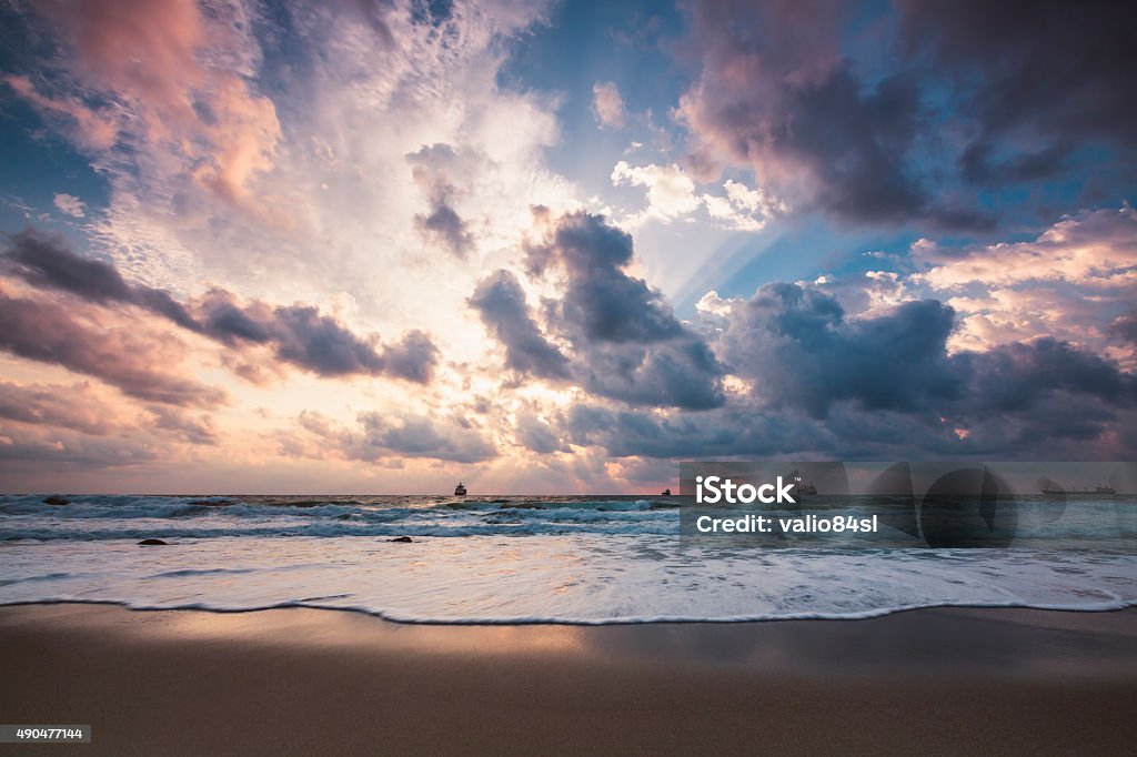 Dramatic cloudscape over the sea, sunrise shot 2015 Stock Photo