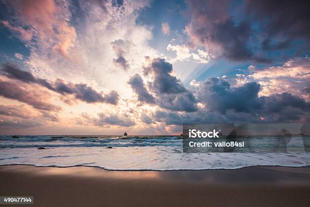 Dramatic Cloudscape Over The Sea Sunrise Shot Stock Photo - Download Image Now - 2015, Atmospheric Mood, Beach