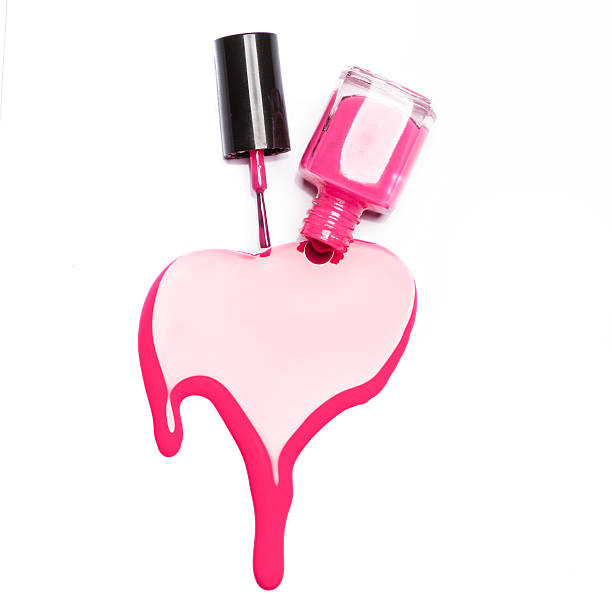 istock Pink nail polish and brush on white background 490477356