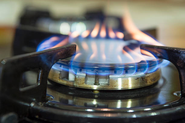 istock Blue flames on gas stove burner. 490478920
