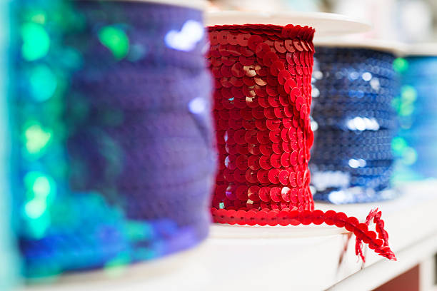 istock Stacks of bright ribbon spools 490479652