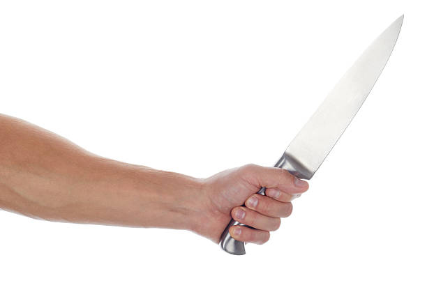 istock Male hand holding big silver kitchen knife 490481588