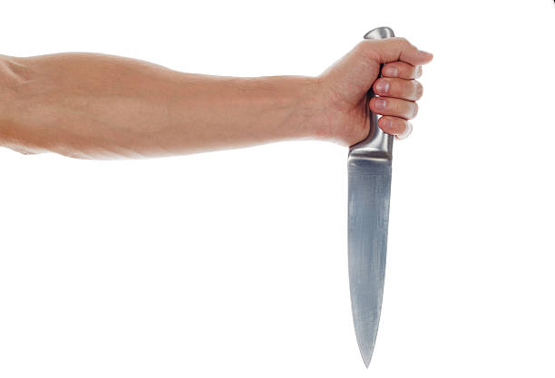istock Male hand holding big silver kitchen knife 490481800