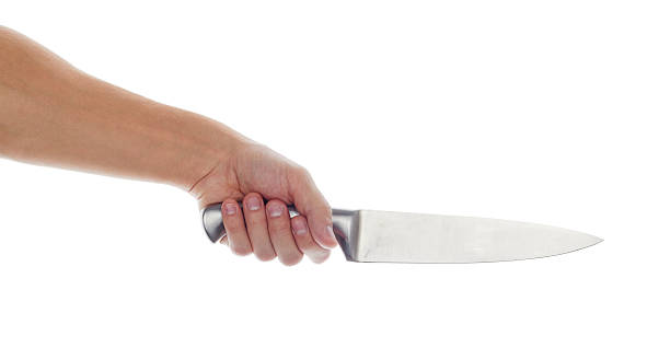 istock Male hand holding big silver kitchen knife 490481864