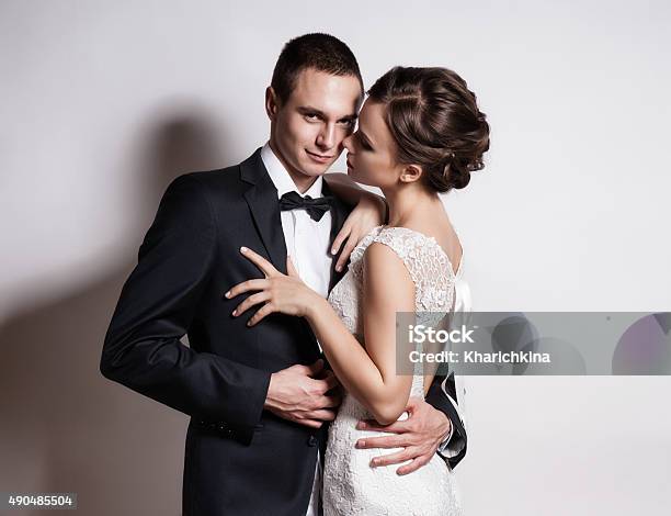 Portrait Of Young Couple In Love Posing At Studio Stock Photo - Download Image Now - Human Hair, Couple - Relationship, Men