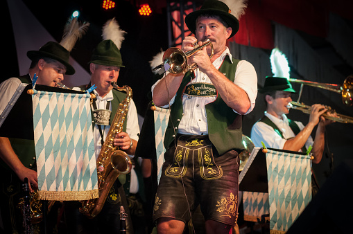 Blumenau, Santa Catarina, Brasil - October 12, 2011: Members from a traditional german band performing during the Oktoberfest. Each year the city of Blumenau in Santa Catarina state invites many bands from Germany to take part in the brazilian Oktoberfest.