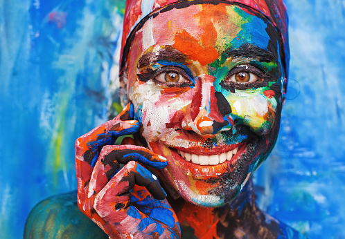 Female smiling face in red hat with hand under your face. Mix of painting and live photo
